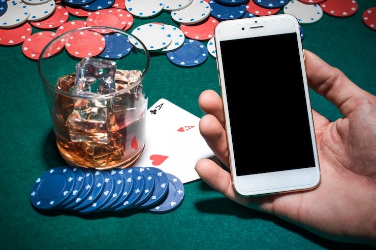 Mobile app interface for Gem Saviour on seven77 login showing bet selector and spin button